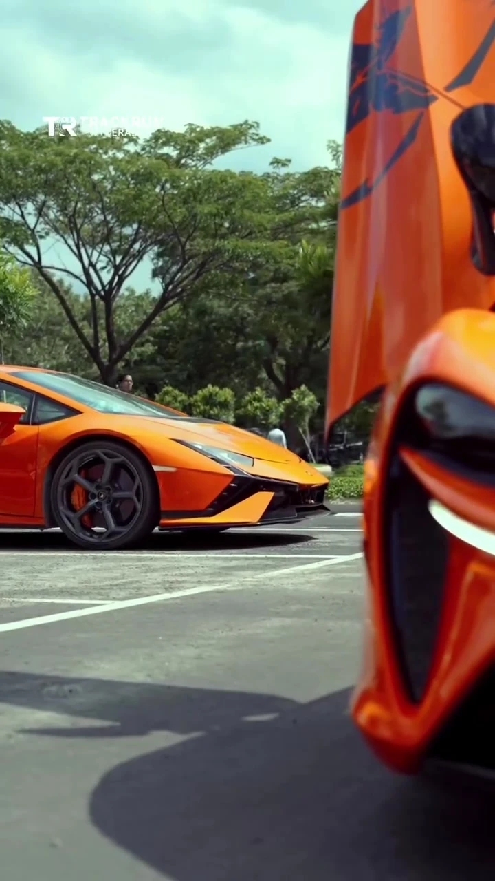 Close detail of an orange supercar rear deck